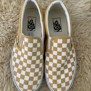 Vans Checkerboard slip-ons in mustard